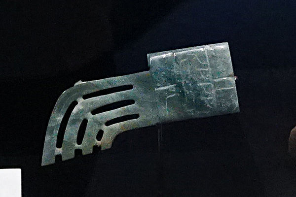 Olmec jadeite pendant with winged claw motif